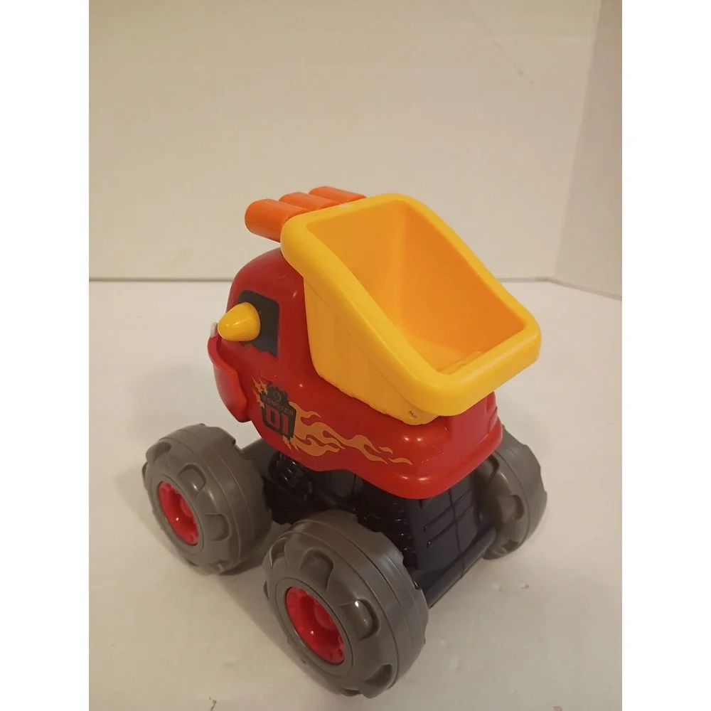 Monster 01 Red Dump Truck Toy One Eyed Monster Flame Decal Yellow Tilt Bed